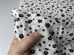 Fastvævet viscose - flotte sorte blomster på hvid bund